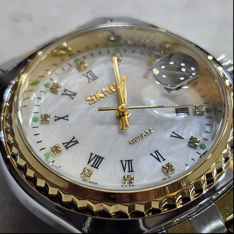 ساعت مچی عقربه ای زنانه اسکمی مدل 9098sil کد 09